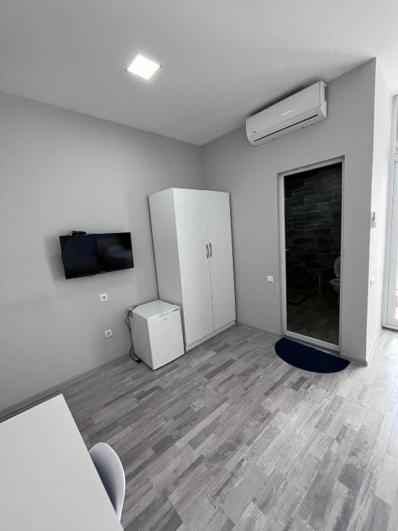 TV a/nebo společenská místnost v ubytování Madona Homestay