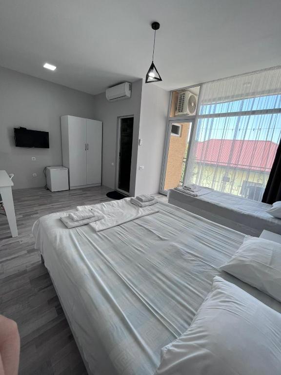 Postel nebo postele na pokoji v ubytování Madona Homestay