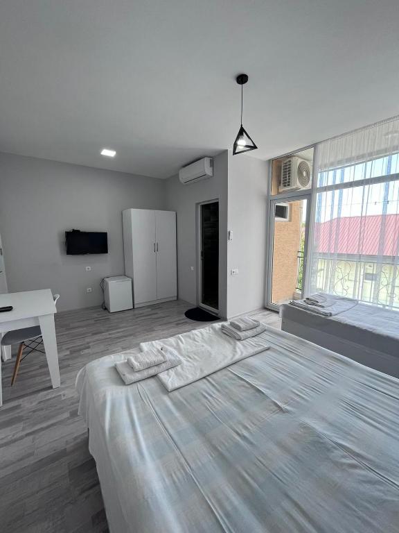 Postel nebo postele na pokoji v ubytování Madona Homestay