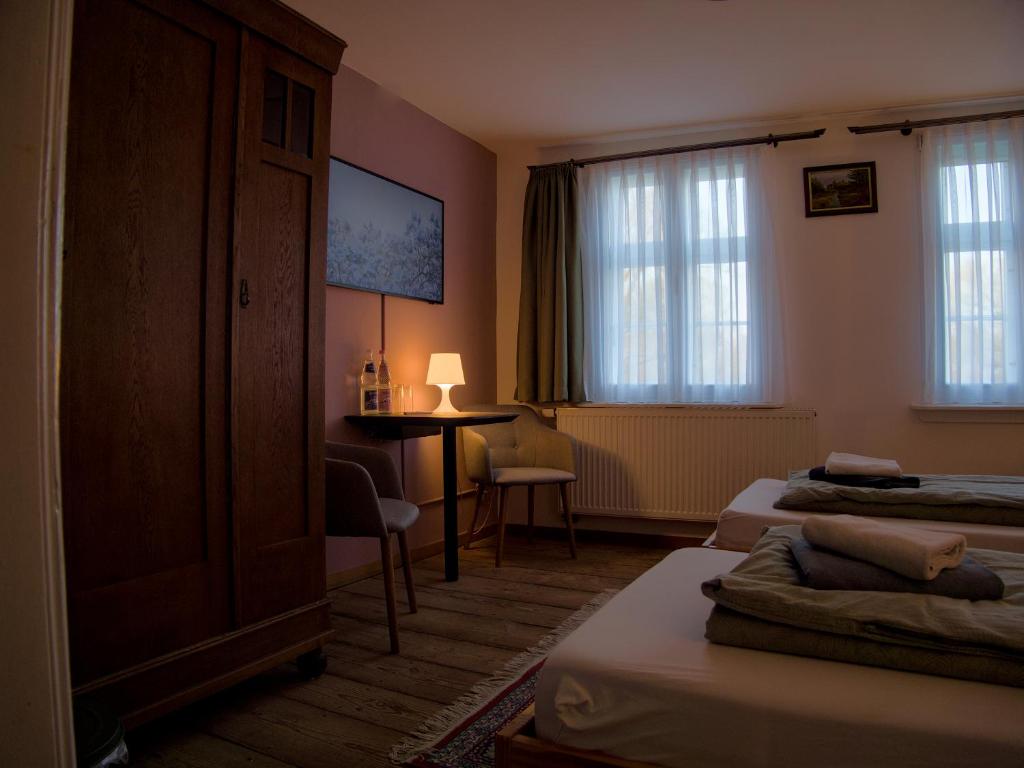 Postel nebo postele na pokoji v ubytování Alandblick