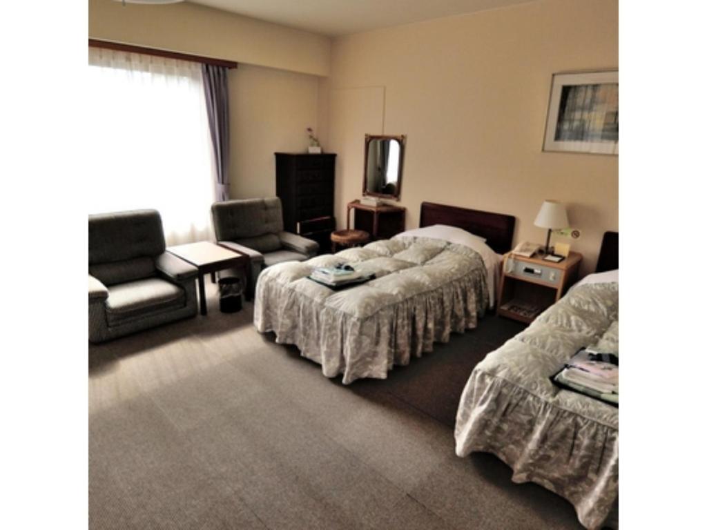 Un televizor și/sau centru de divertisment la Hotel Tetora Resort Tateyama Kokusai - Vacation STAY 55697v