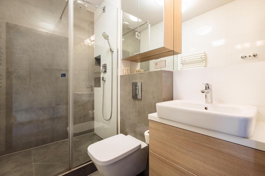 Kúpeľňa v ubytovaní Olimp Apartments