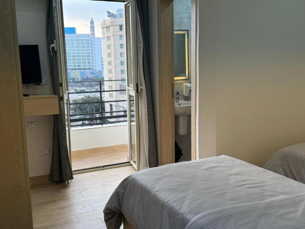 Postel nebo postele na pokoji v ubytování Landmark Hostel Cairo