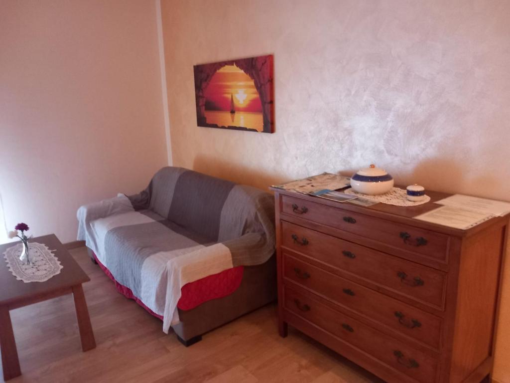 Postel nebo postele na pokoji v ubytování Casa Teodoro - Gelsomino, Ulivi & Orchidea