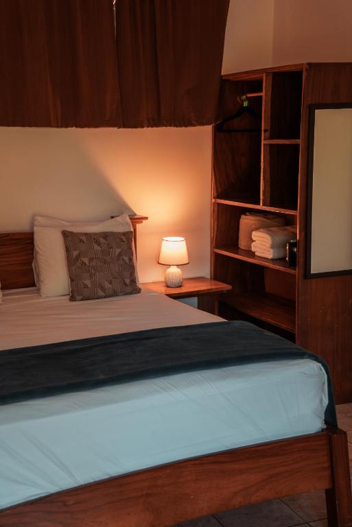 Postel nebo postele na pokoji v ubytování Hotel Villa Del Sol