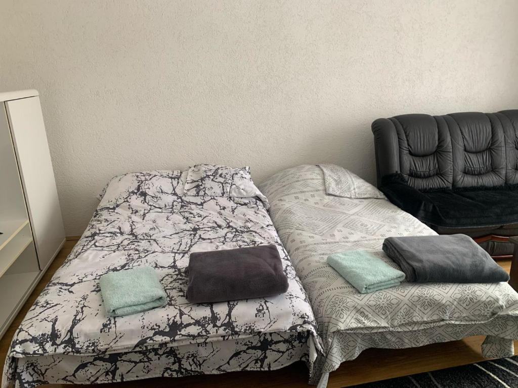 Postel nebo postele na pokoji v ubytování Ralin Apart