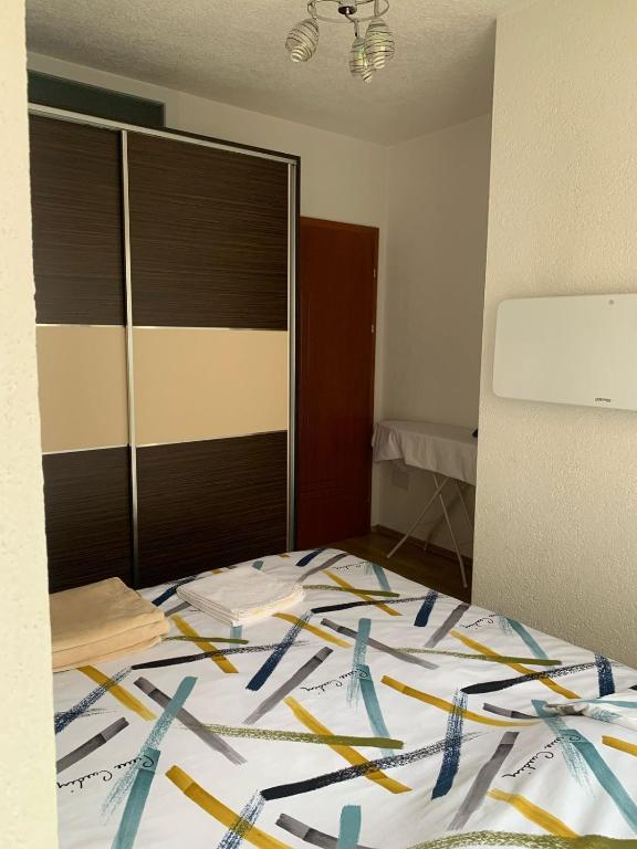 Postel nebo postele na pokoji v ubytování Ralin Apart