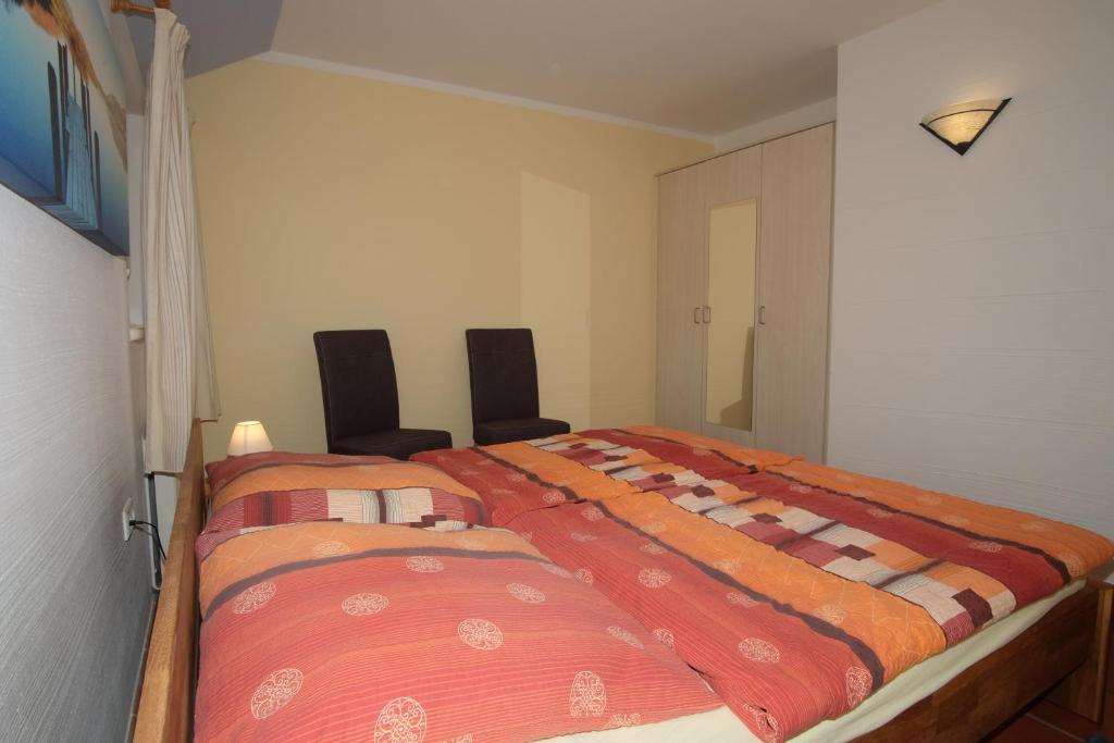 Postel nebo postele na pokoji v ubytování Haus Benny