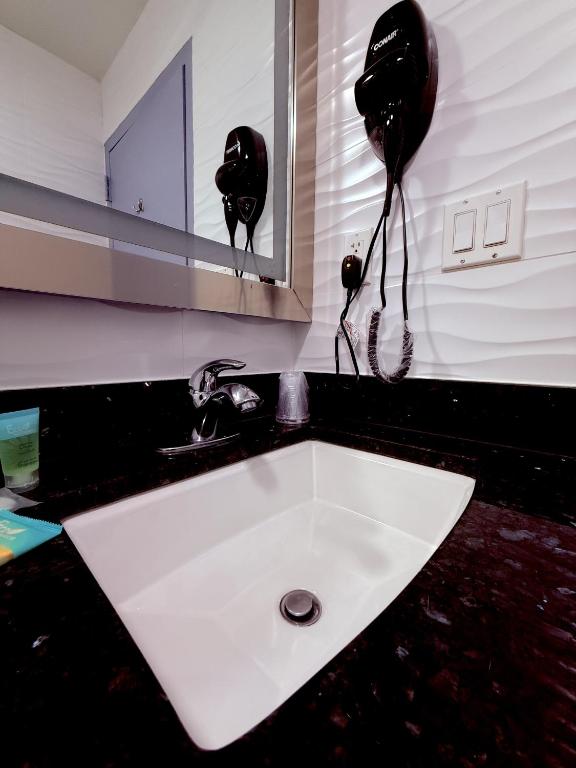Koupelna v ubytování Umbrella Hotel Bronx