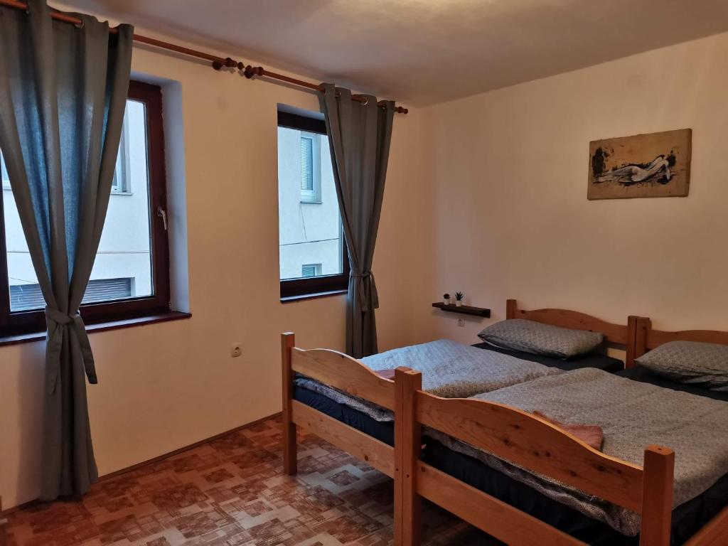 Postel nebo postele na pokoji v ubytování Sobe Pri Olivi