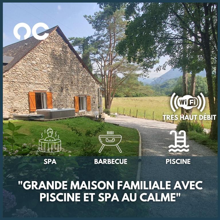 un panneau devant une maison en pierre dans l'établissement Maison familiale Baylère - Piscine et spa - 8 pers, à Buzy