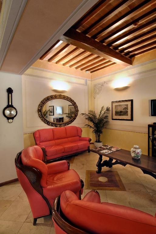 TV a/nebo společenská místnost v ubytování Hotel Bologna