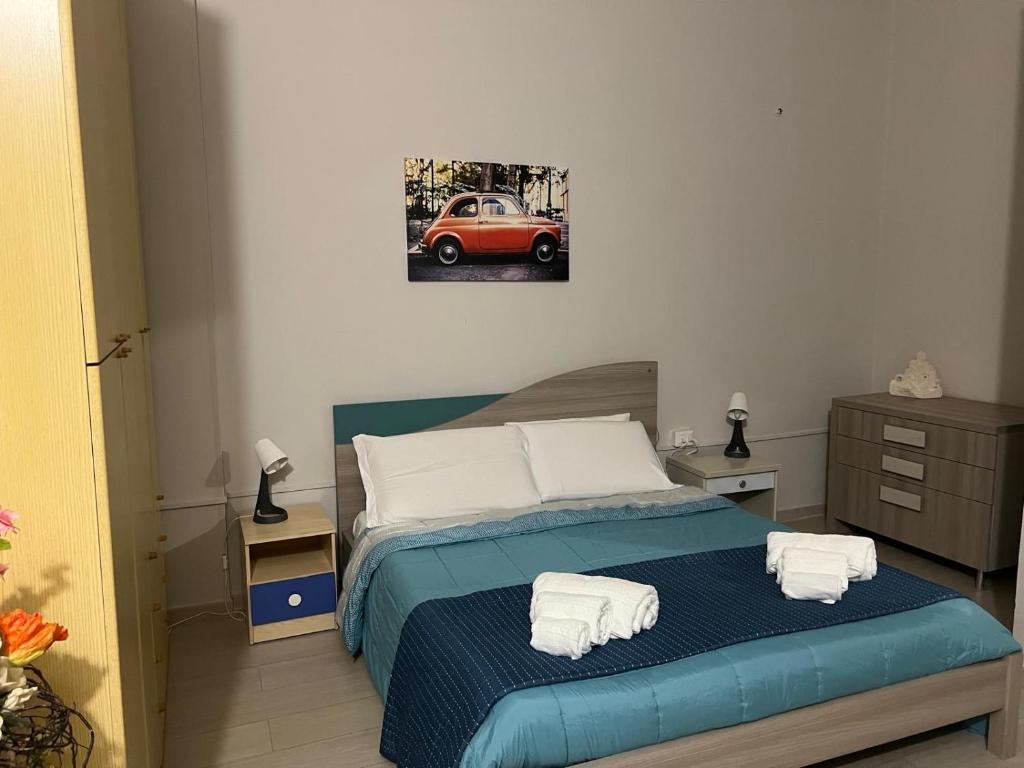 Ένα ή περισσότερα κρεβάτια σε δωμάτιο στο Il Sorriso