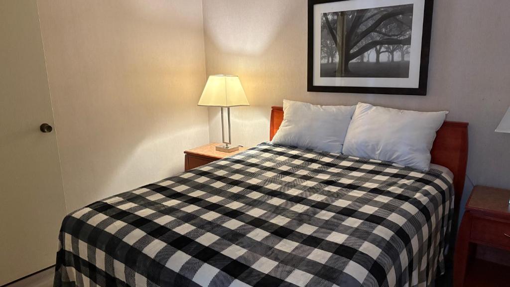 Postel nebo postele na pokoji v ubytování Art Infiniti Hotel