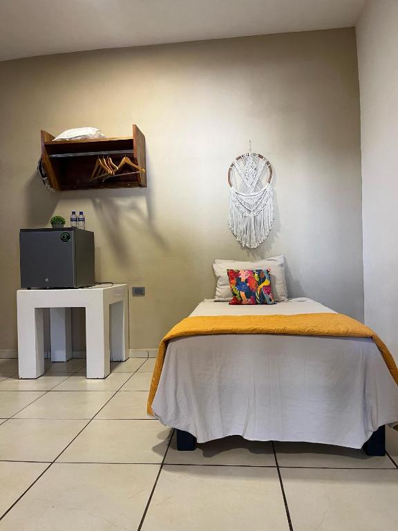 Postel nebo postele na pokoji v ubytování Quinta Rosita