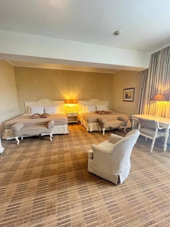 Postel nebo postele na pokoji v ubytování Hotel Roraima Inn