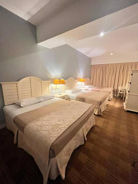 Postel nebo postele na pokoji v ubytování Hotel Roraima Inn