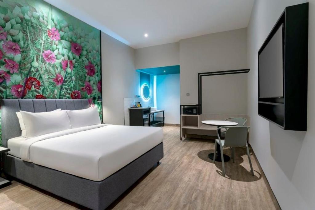 Postel nebo postele na pokoji v ubytování ibis Styles Sepang KLIA
