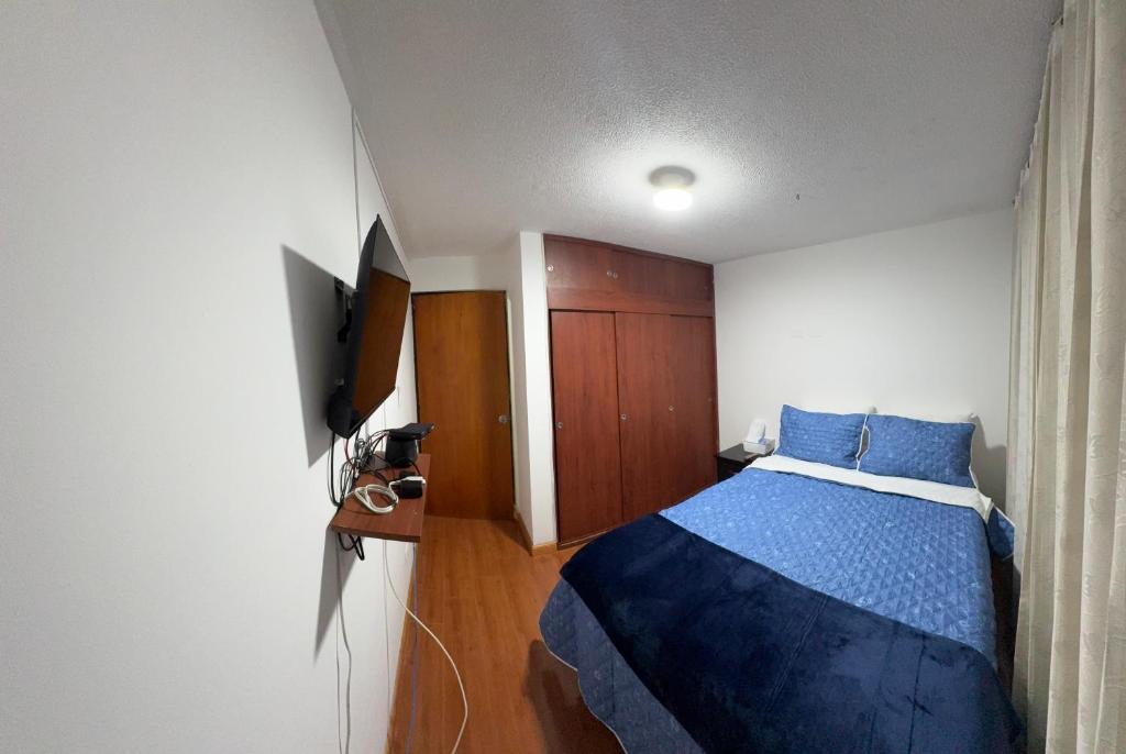 TV a/nebo společenská místnost v ubytování Hotel Dorado - Cerca al Aeropuerto - Habitación 201