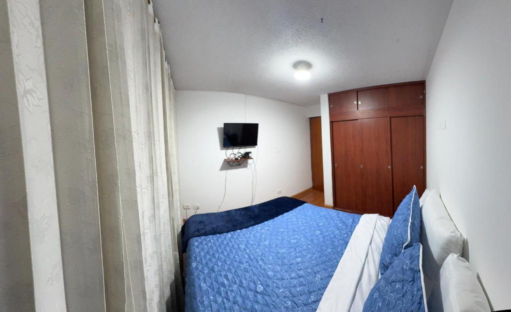 Postel nebo postele na pokoji v ubytování Hotel Dorado - Cerca al Aeropuerto - Habitación 201