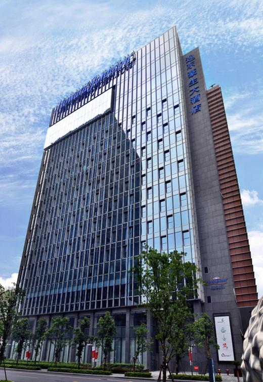 a large office building with a lot of windows at Howard Johnson IFC Plaza Ningbo in Ningbo