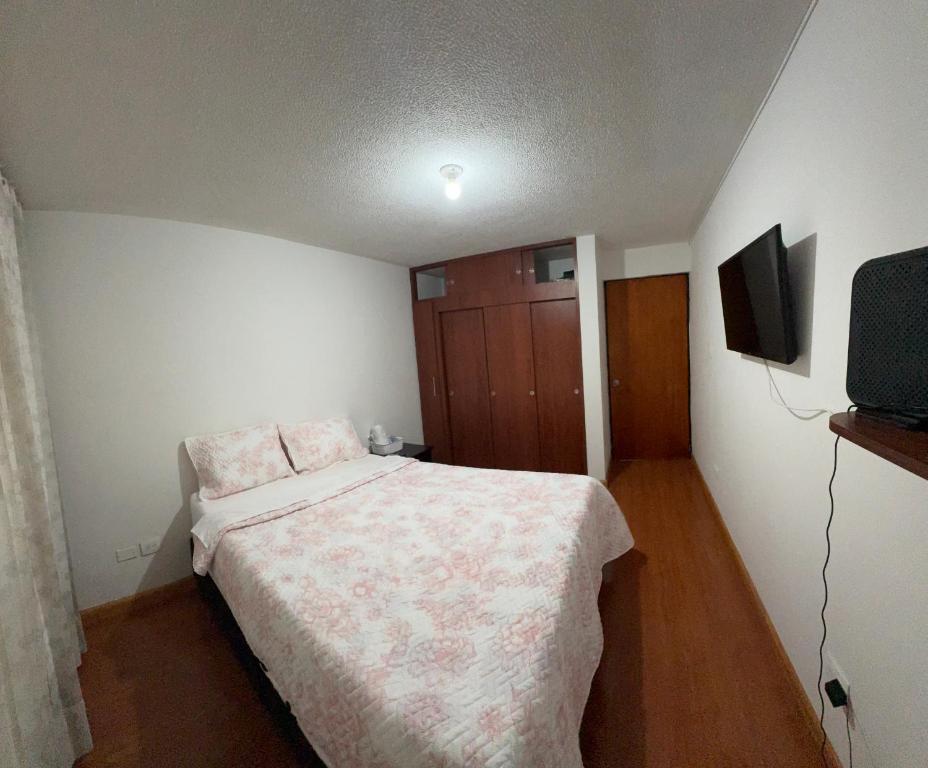 Postel nebo postele na pokoji v ubytování Hotel Dorado - Cerca al Aeropuerto - Habitación 202