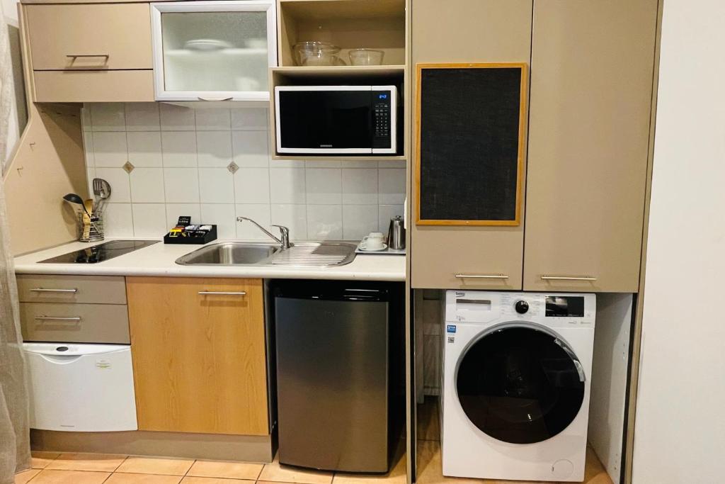 Quest Atrium Apartment Hotel - Resim 7