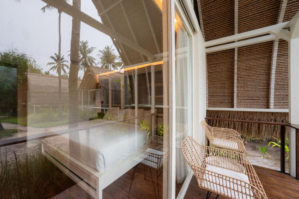 Un balcón o terraza de Hotel Lumi Gili Trawangan