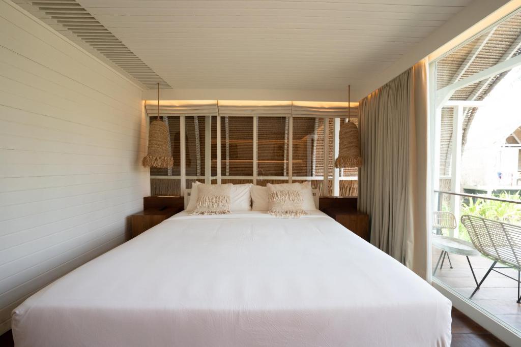 Cama o camas de una habitación en Hotel Lumi Gili Trawangan