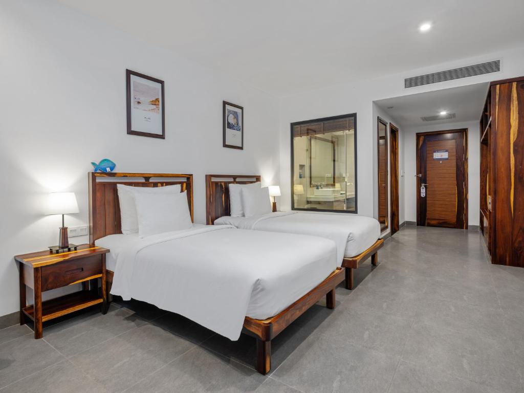Phòng Deluxe 2 giường đơn với ban công