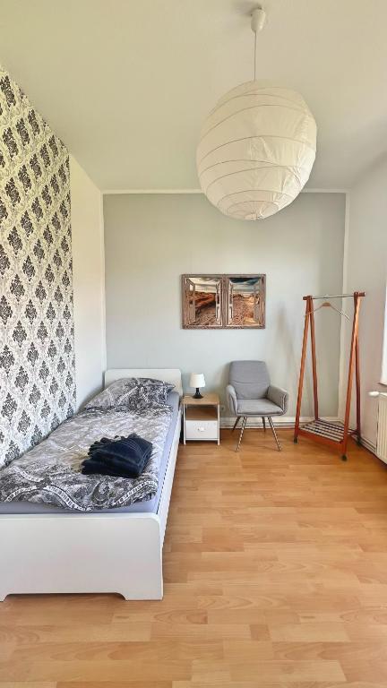 Postel nebo postele na pokoji v ubytování Etage1