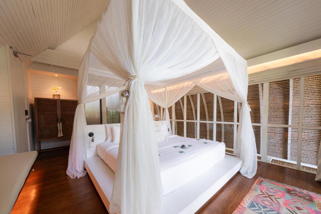 Cama o camas de una habitación en Hotel Lumi Gili Trawangan