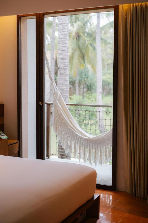 Cama o camas de una habitación en Hotel Lumi Gili Trawangan