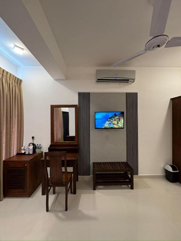 TV a/nebo společenská místnost v ubytování Sevonra Beach Resort