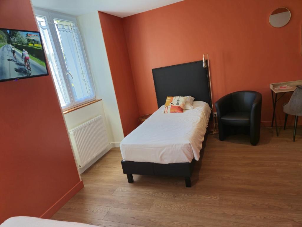 Postel nebo postele na pokoji v ubytování Le Beaugency