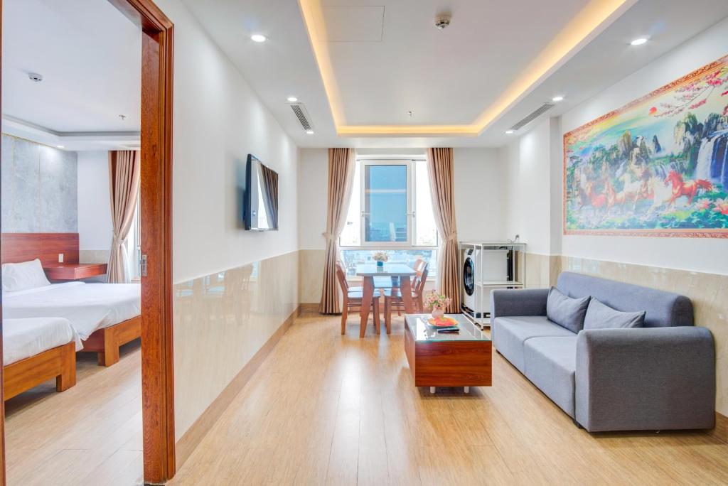 Postel nebo postele na pokoji v ubytování Phan Van 2 hotel
