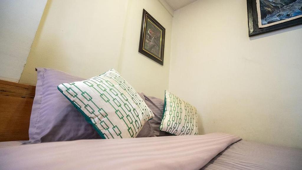 Postel nebo postele na pokoji v ubytování Hotel Shree Tara
