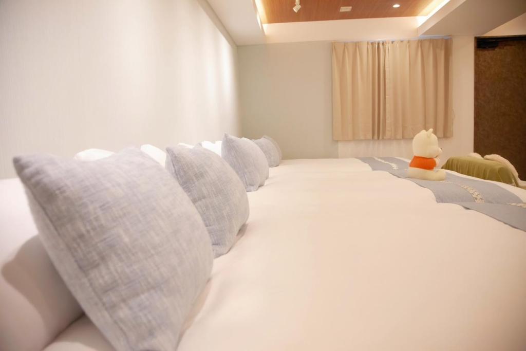 Ein Bett oder Betten in einem Zimmer der Unterkunft 森下小屋