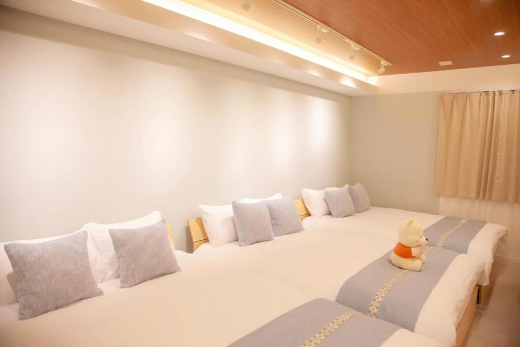 Ein Bett oder Betten in einem Zimmer der Unterkunft 森下小屋