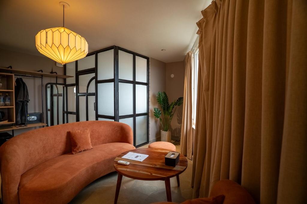 Posezení v ubytování Minimalist Panjim