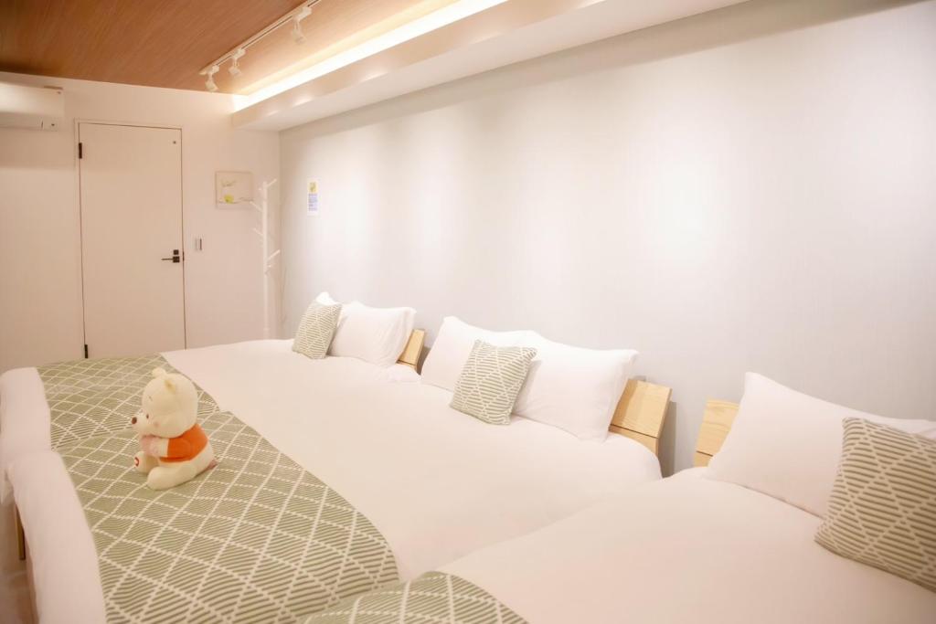 Ein Bett oder Betten in einem Zimmer der Unterkunft 森下小屋