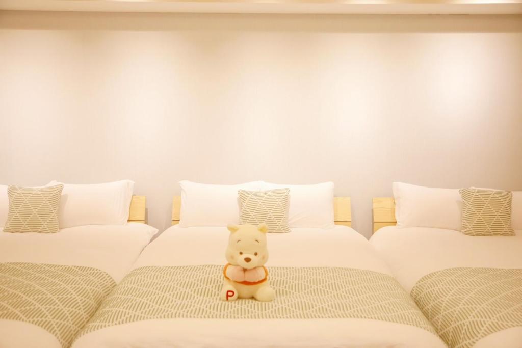 Ein Bett oder Betten in einem Zimmer der Unterkunft 森下小屋