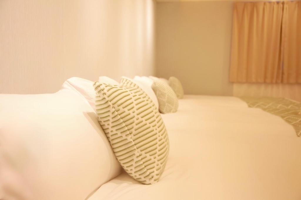Ein Bett oder Betten in einem Zimmer der Unterkunft 森下小屋