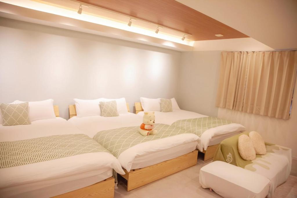 Ein Bett oder Betten in einem Zimmer der Unterkunft 森下小屋
