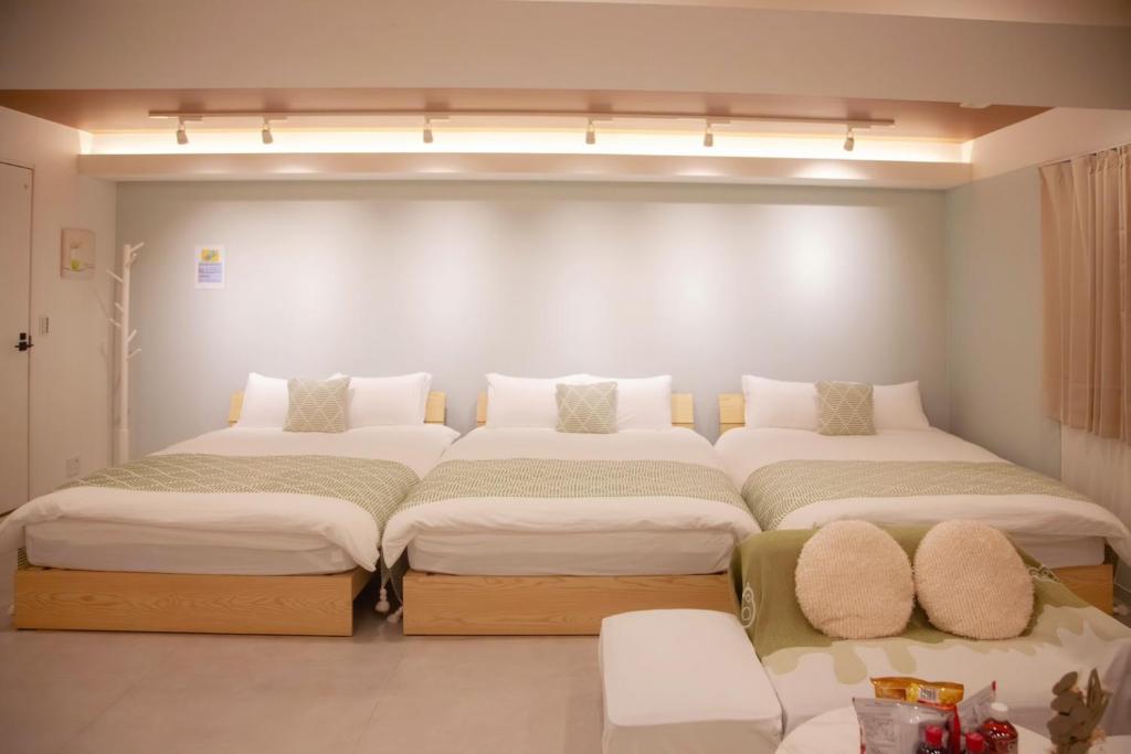 Ein Bett oder Betten in einem Zimmer der Unterkunft 森下小屋