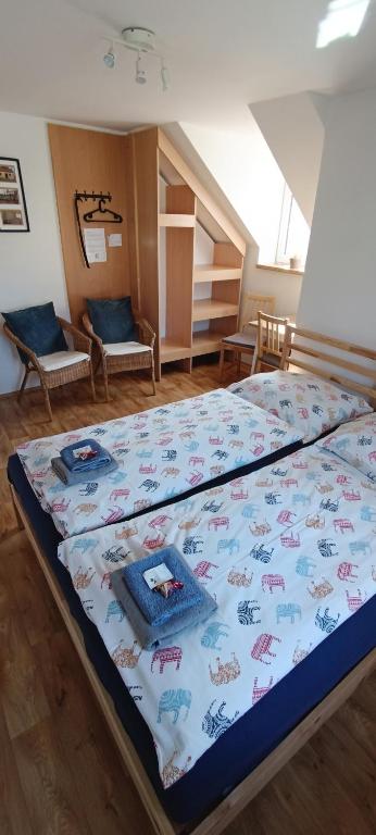 Postel nebo postele na pokoji v ubytování Ubytování U Tajčů