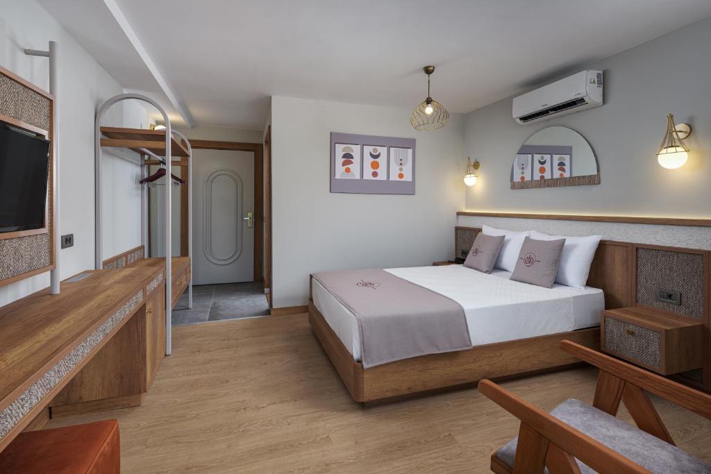 Postel nebo postele na pokoji v ubytování Monk Resort Hotel Beldibi