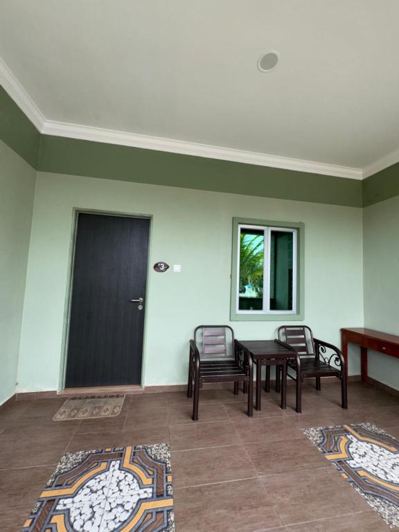 Posezení v ubytování Cenang Room Rahsia Motel