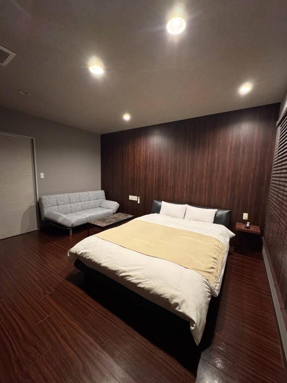 Hotel JOYCEにあるベッド