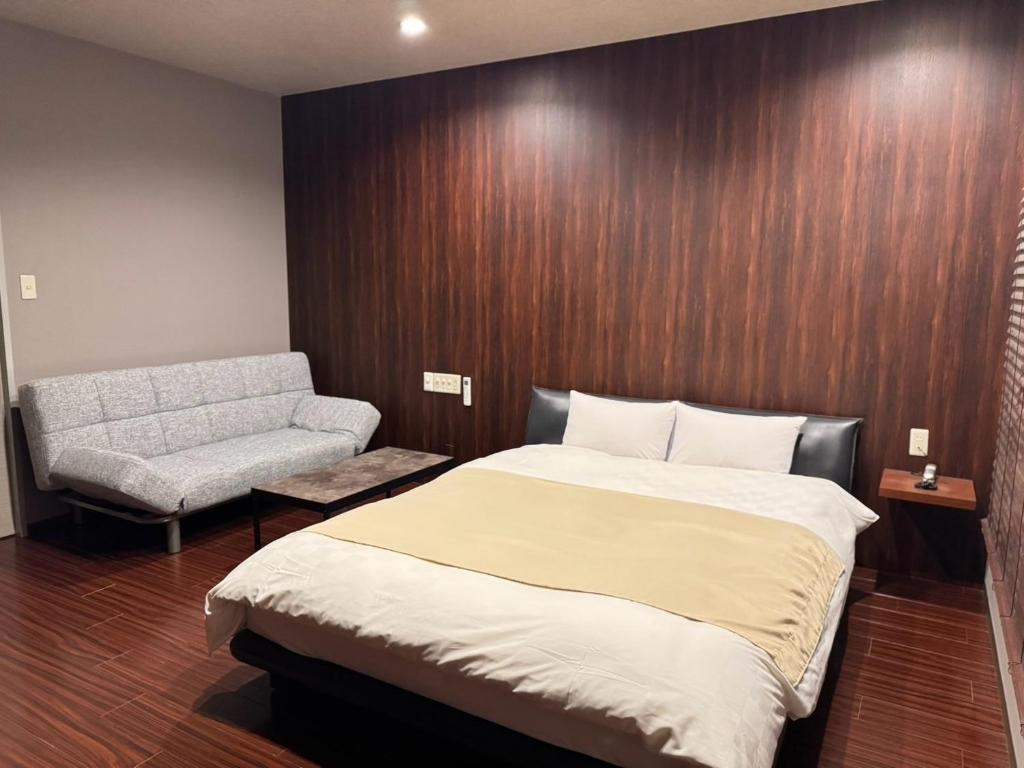 Hotel JOYCEにあるベッド